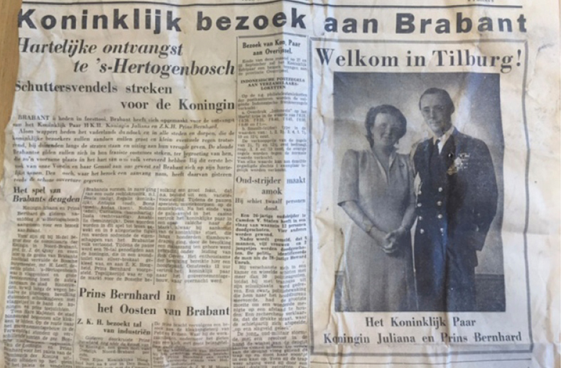 krant met foto 'welkom in Tilburg' met het koninklijk paar